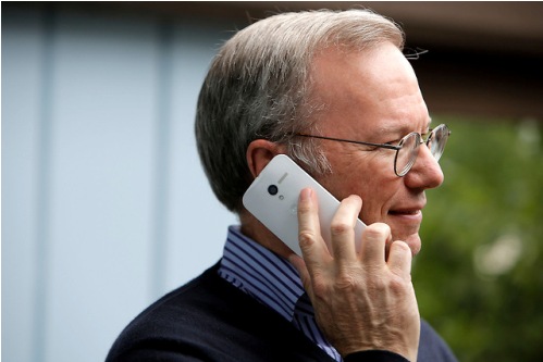 Eric Schmidt, executive chairman of Google, uses the yet to be released Google produced Moto X phone during day two of Allen and Company's 31st Annual Media and Technology Conference in Sun Valley, Idaho, July 10, 2013. The event brings together the leaders of the worlds of media, technology, sports, industry and politics.  INSIDER IMAGES/Gary He (UNITED STATES)