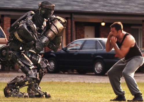 robot boxeando con hombre